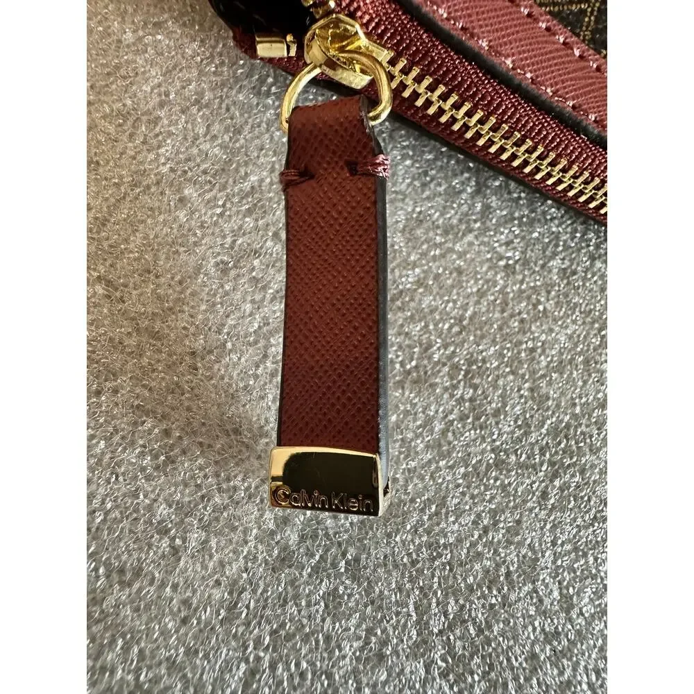 EUC Calvin Klein CK Monogram Wristlet Brown Burgundy Gold Zip Clutch RN54163